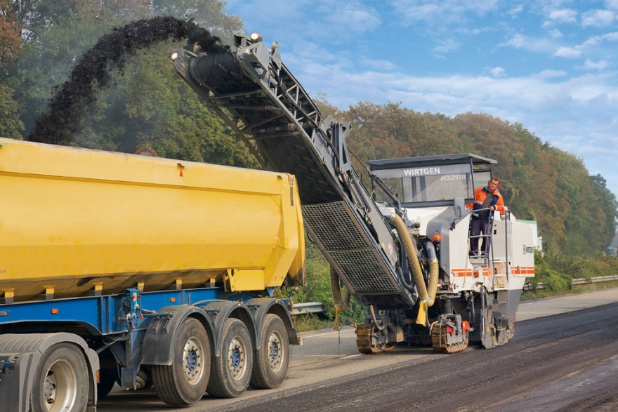 Asphalt road being milled in preparation for repaving